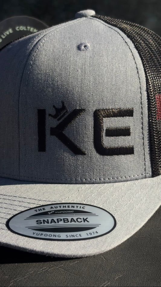 KE GREY & BLACK SNAPBACK
